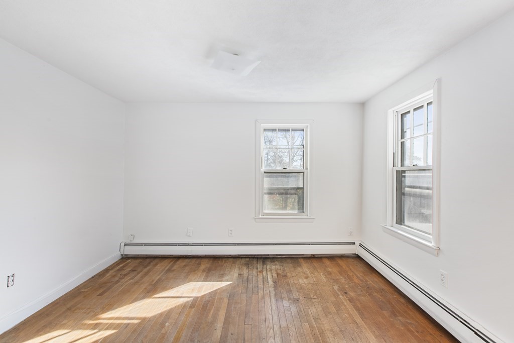 103 Myrtle Street Ashland, MA 01721 - Photo 22 of 38 an empty room with a window