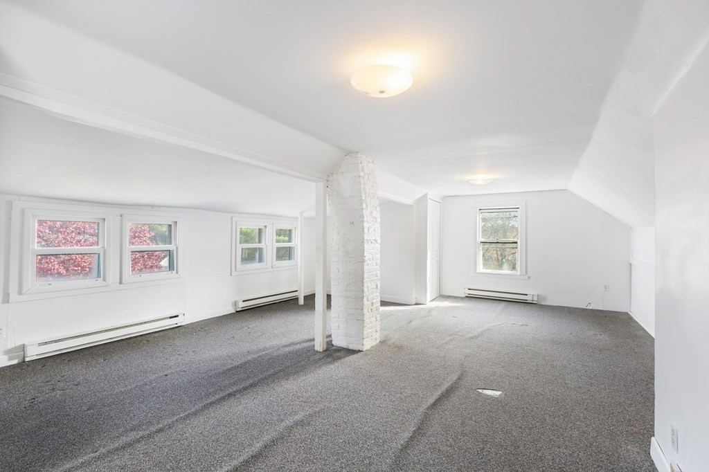 103 Myrtle Street Ashland, MA 01721 - Photo 25 of 38 an empty room with windows