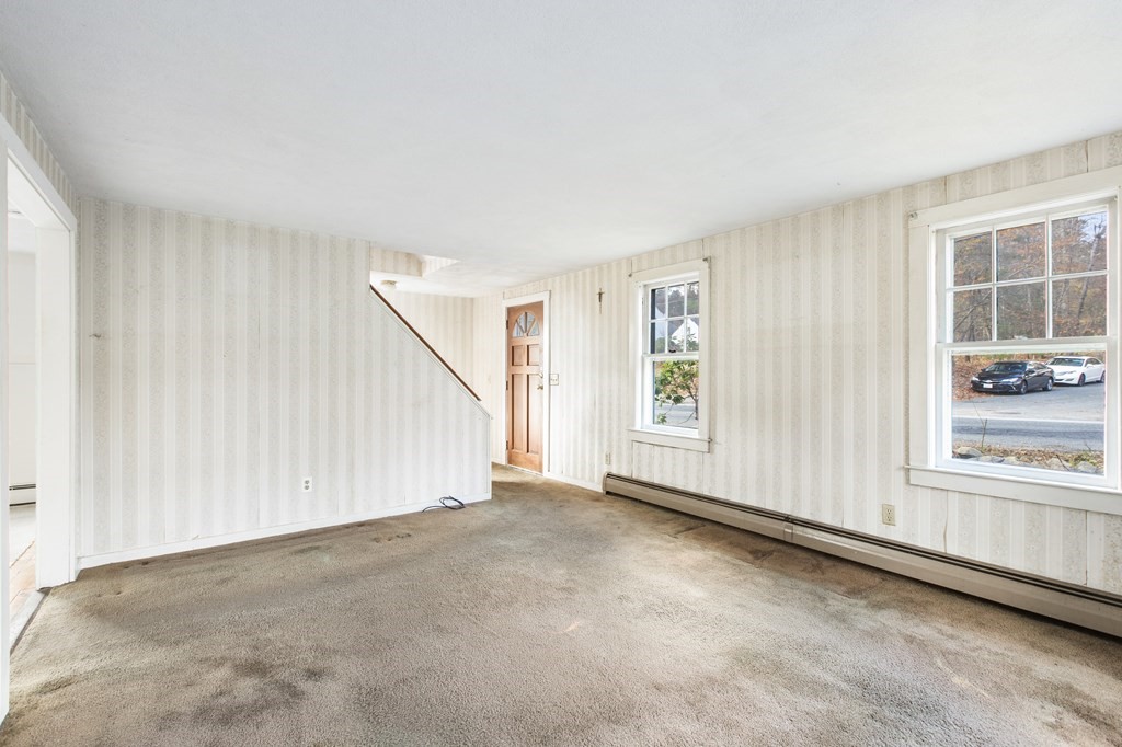 103 Myrtle Street Ashland, MA 01721 - Photo 3 of 38 an empty room with windows
