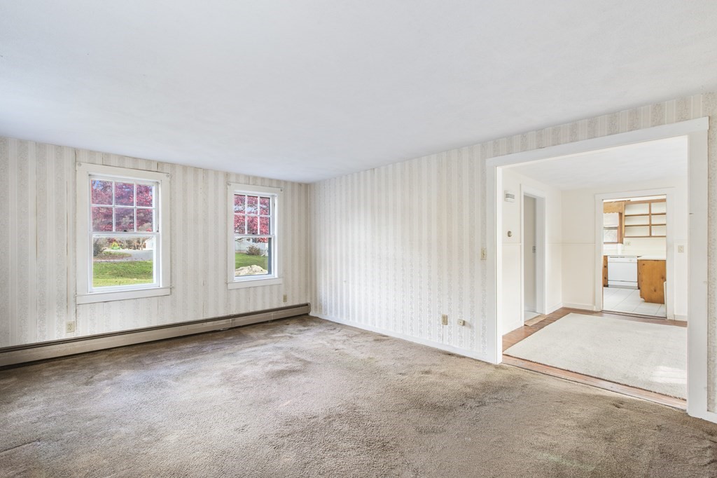 103 Myrtle Street Ashland, MA 01721 - Photo 5 of 38 an empty room with windows