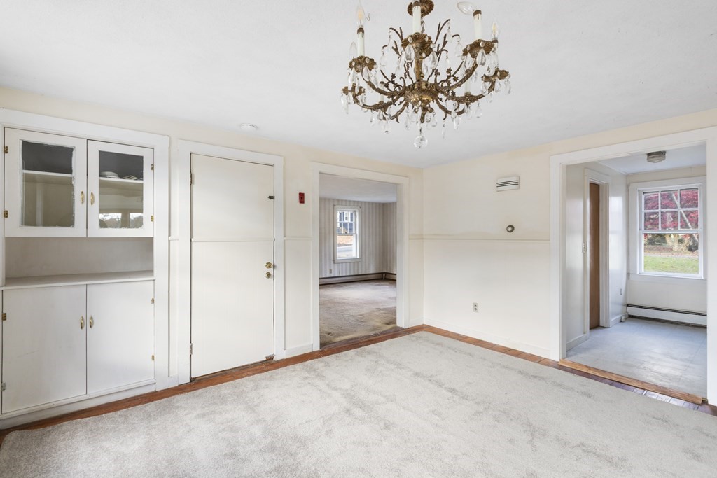 103 Myrtle Street Ashland, MA 01721 - Photo 6 of 38 an empty room with a empty space and windows