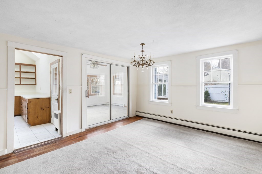 103 Myrtle Street Ashland, MA 01721 - Photo 8 of 38 a view of an empty room with a window