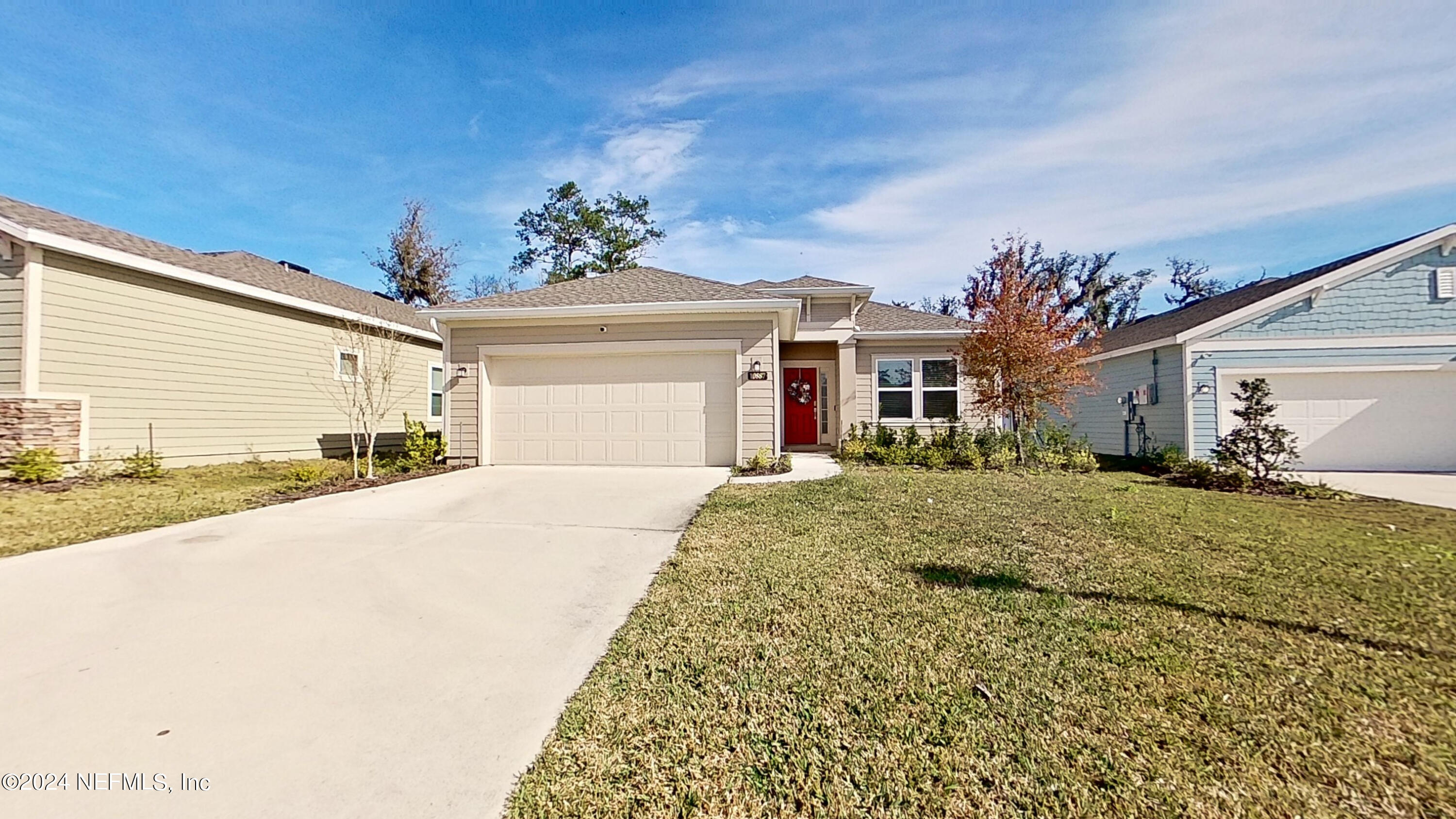 a very nice looking house with a large window