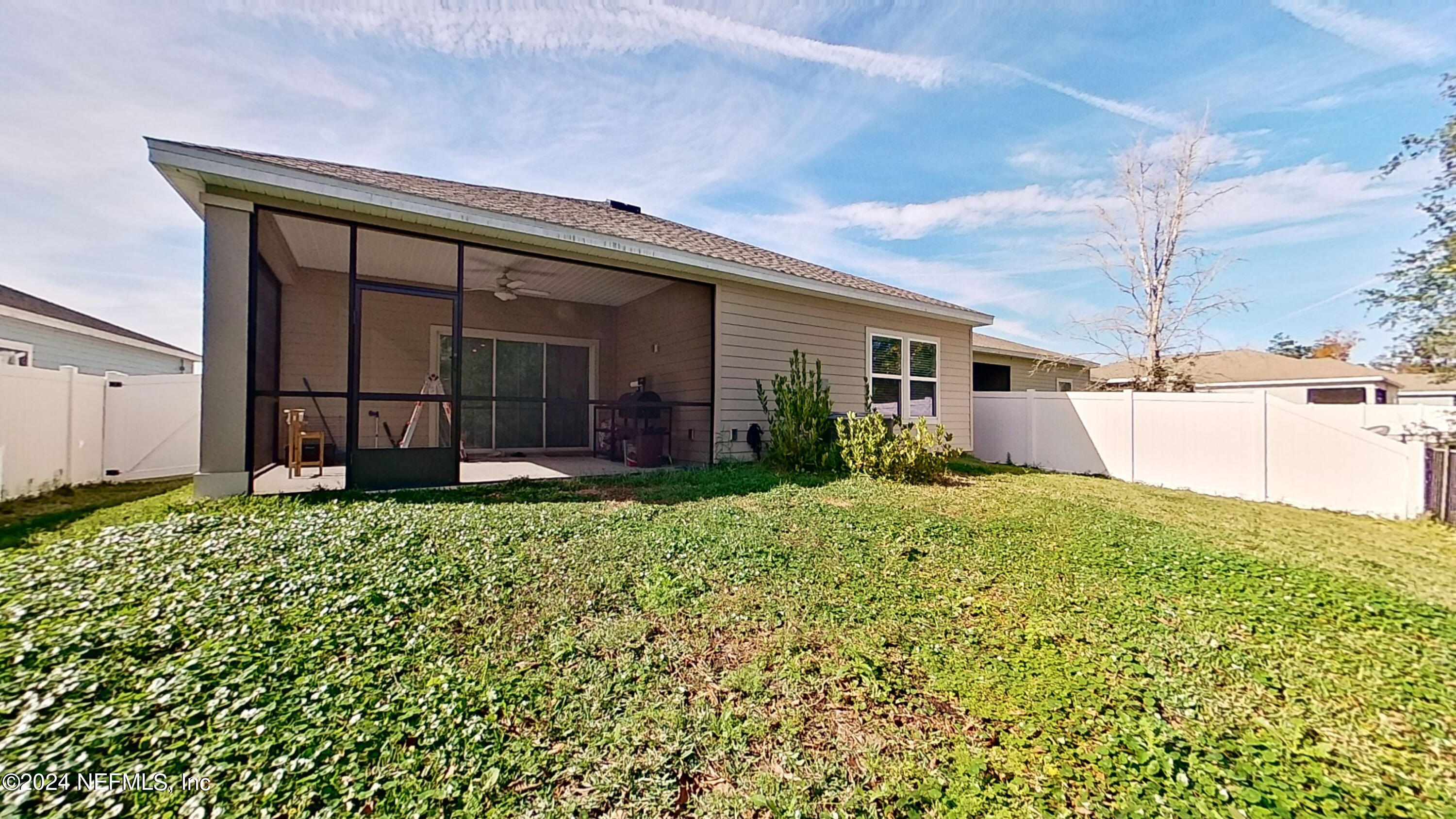 10887 Ventnor Avenue Jacksonville, FL 32218 - Photo 18 of 19 a front view of a house with garden