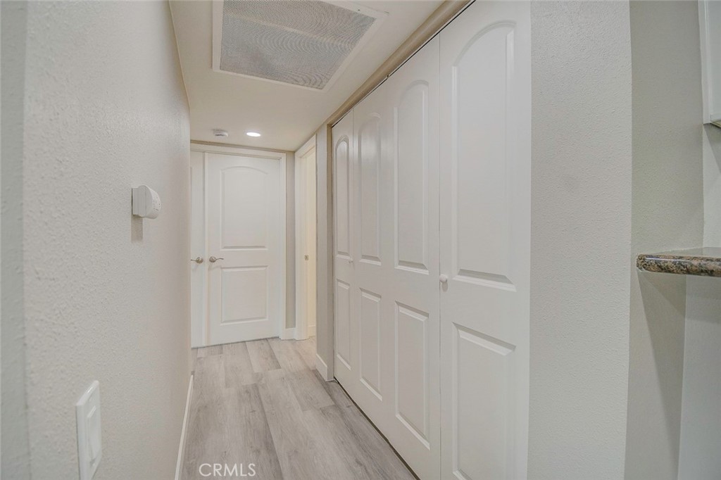 21941 Rimhurst Drive, Unit D Lake Forest, CA 92630 - Photo 17 of 44 a view of a hallway