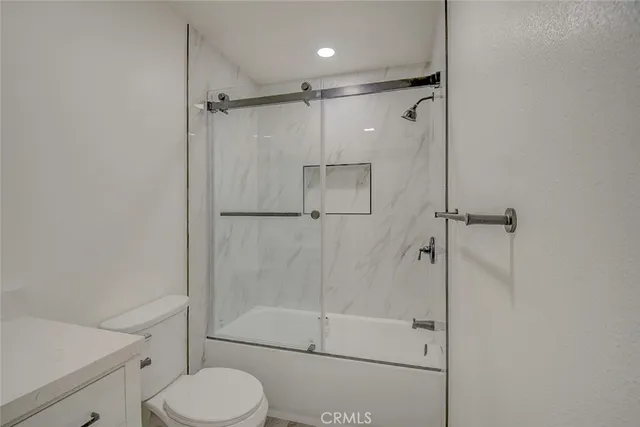 a view of a glass door with a backyard