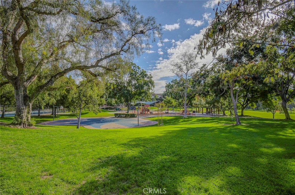 21941 Rimhurst Drive, Unit D Lake Forest, CA 92630 - Photo 39 of 44 a view of a park with trees in the background