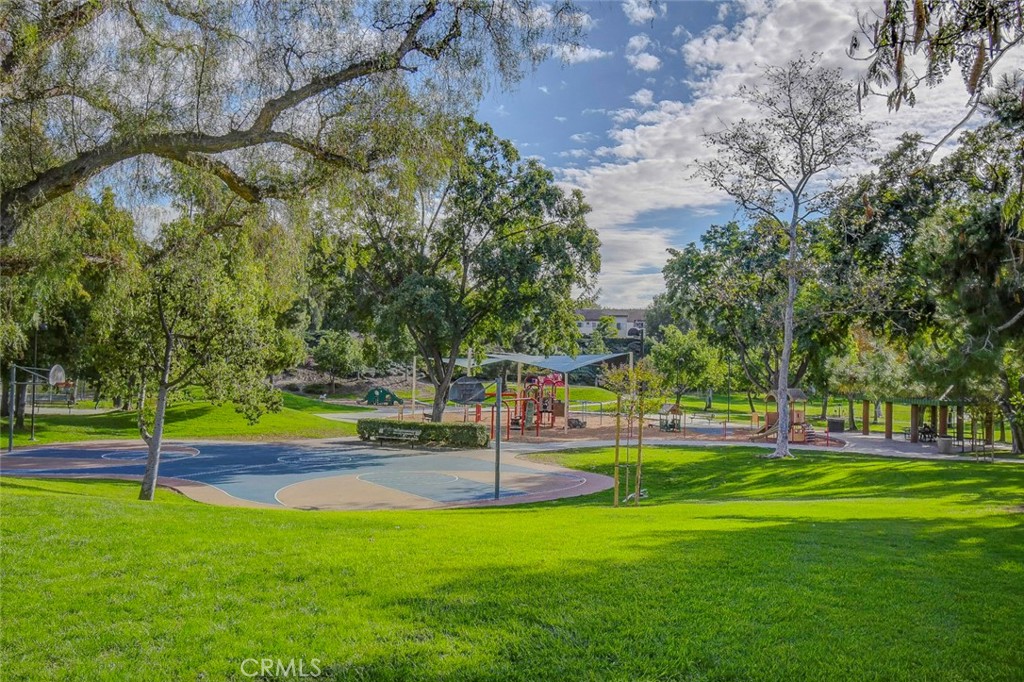 21941 Rimhurst Drive, Unit D Lake Forest, CA 92630 - Photo 40 of 44 a view of a park with large trees