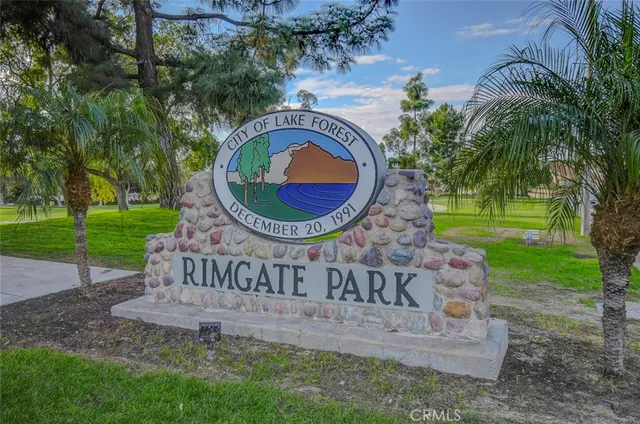 a view of a big yard with a large trees