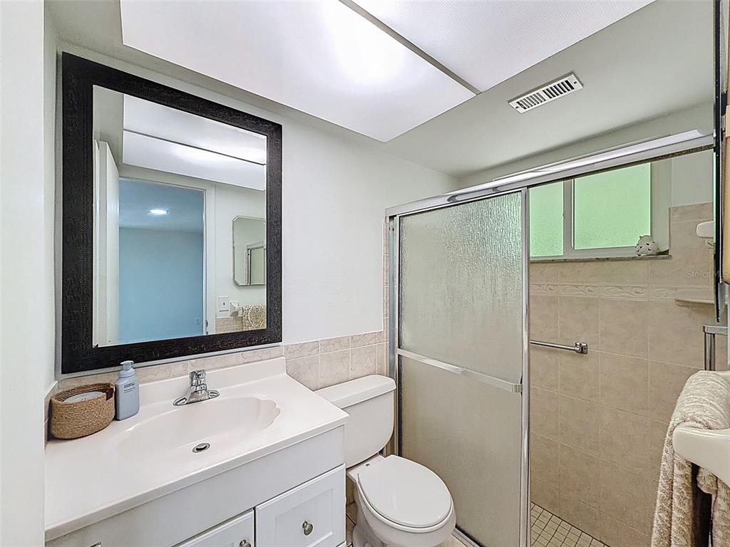 4224 Terrapin Place, Unit 4224 New Port Richey, FL 34652 - Photo 35 of 58 a bathroom with a sink toilet and shower