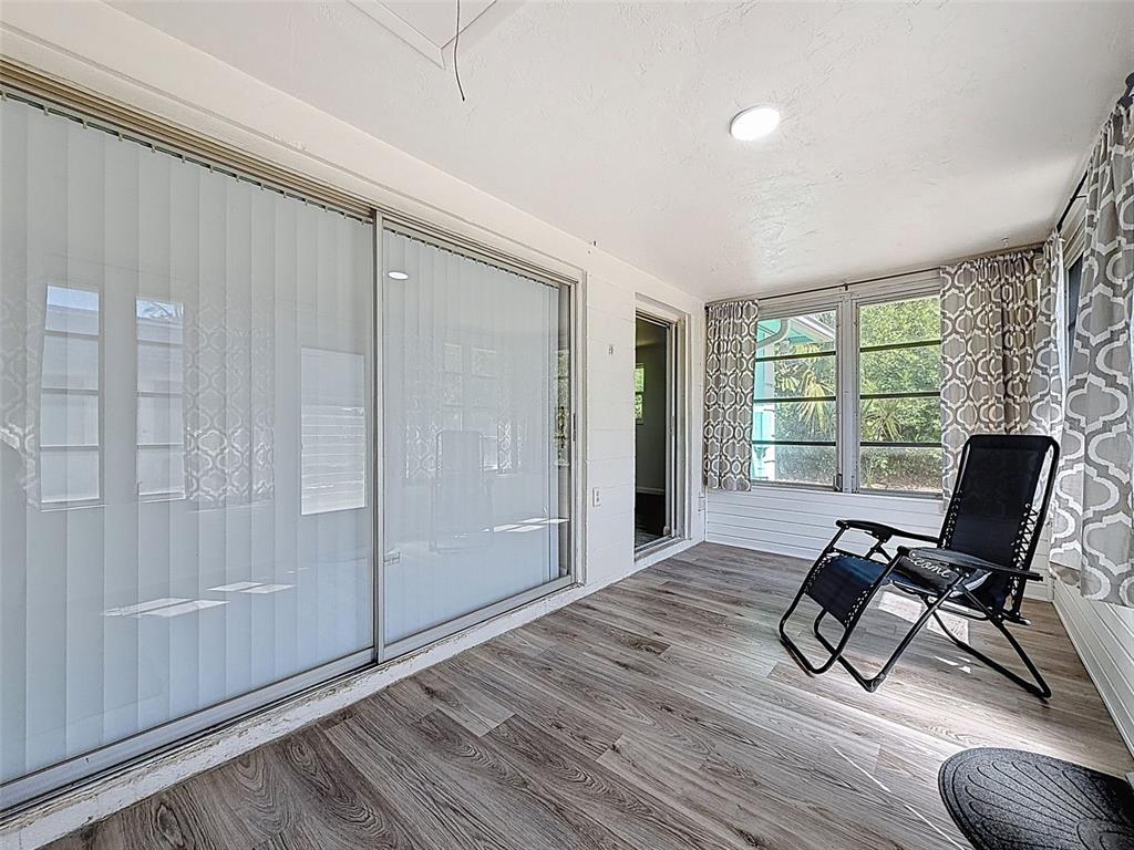4224 Terrapin Place, Unit 4224 New Port Richey, FL 34652 - Photo 40 of 58 a view of a livingroom with lounge chair and windows