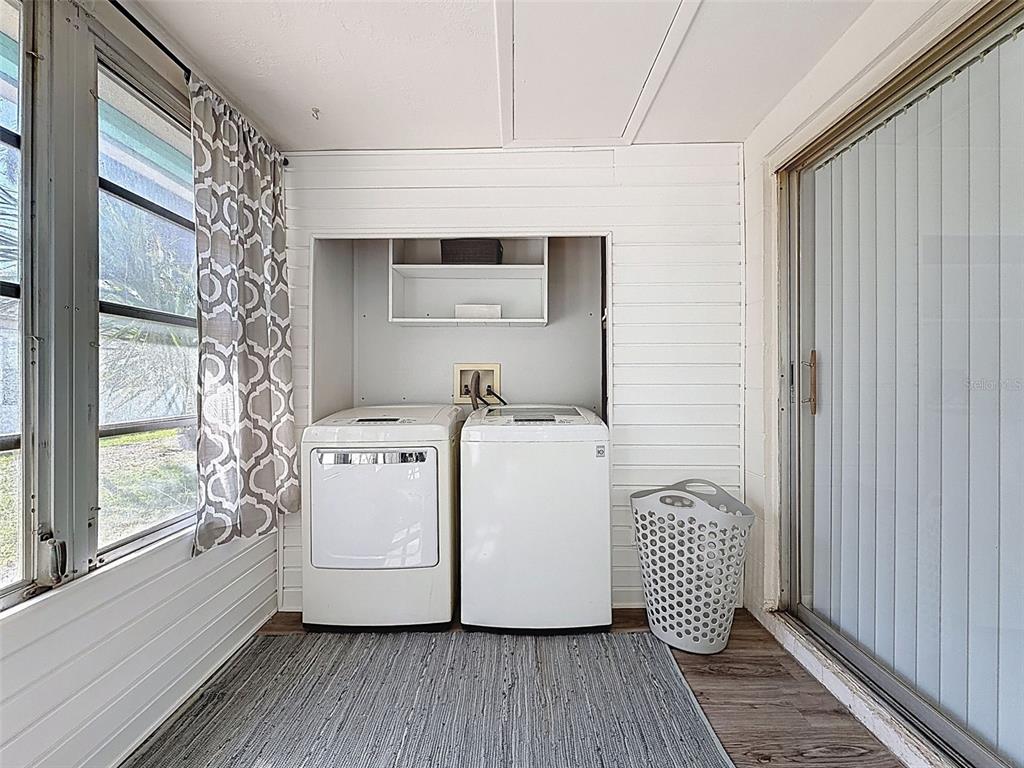 4224 Terrapin Place, Unit 4224 New Port Richey, FL 34652 - Photo 41 of 58 a utility room with dryer and washer