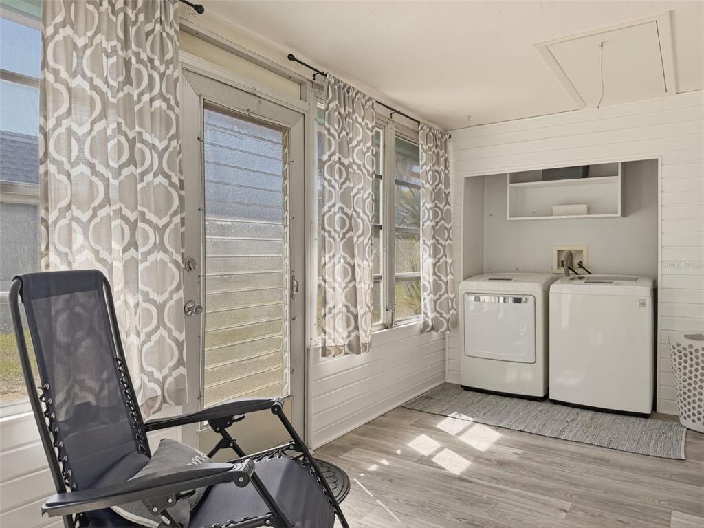 4224 Terrapin Place, Unit 4224 New Port Richey, FL 34652 - Photo 45 of 58 a view of a hallway with washer and dryer