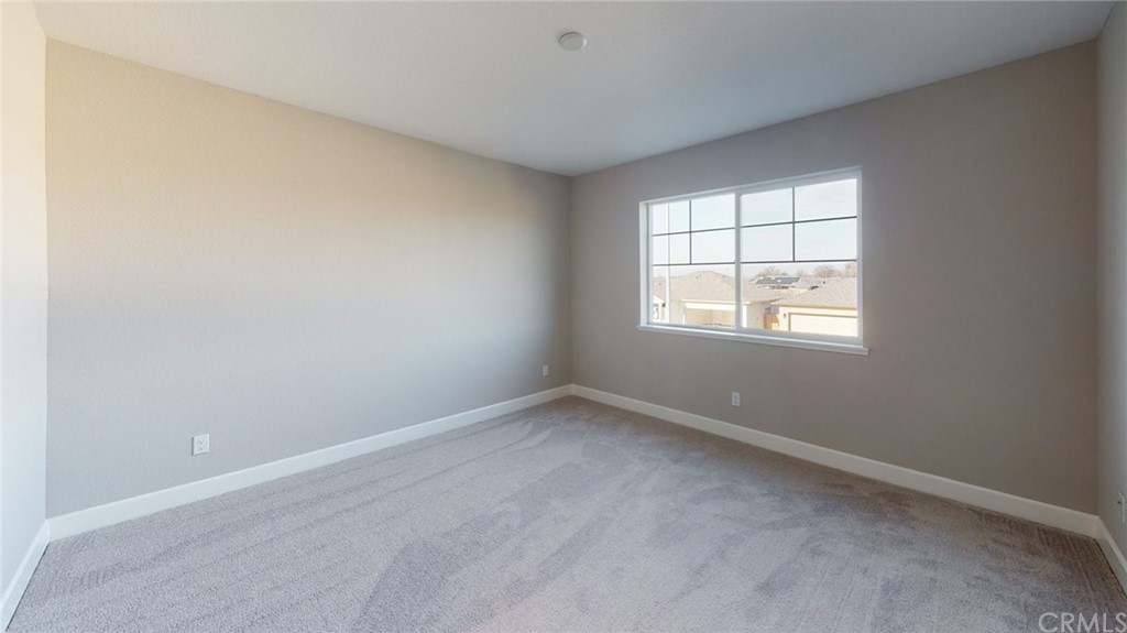 63 Bentwater Loop Chico, CA 95973 - Photo 8 of 20 an empty room with a window