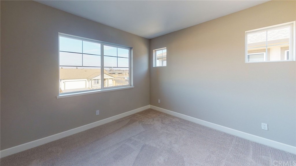 63 Bentwater Loop Chico, CA 95973 - Photo 9 of 20 an empty room with a window