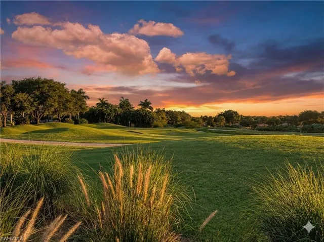 a view of a lake with a big yard