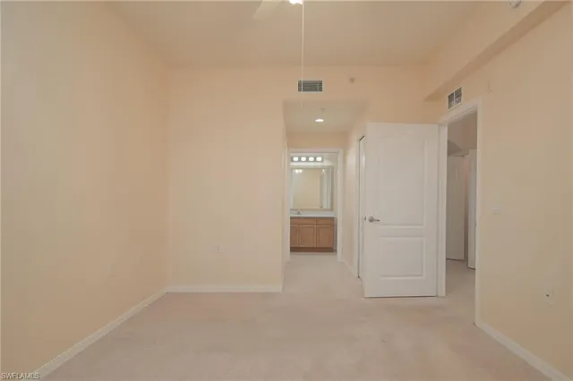 a bathroom with a sink vanity and a mirror