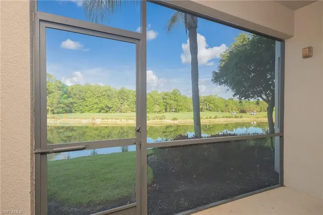 a view of a lake from a yard