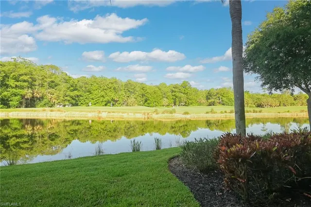 an aerial view of a houses and city street