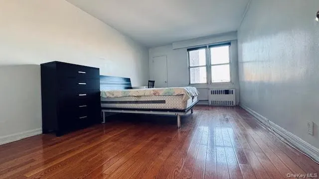 a bedroom with a bed and a closet