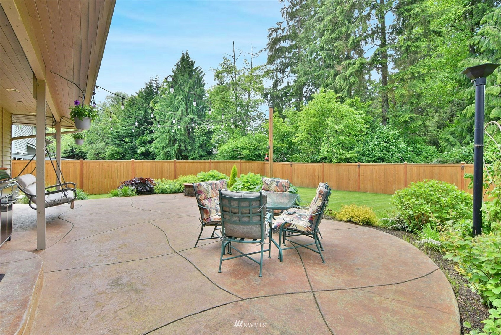 11810 37th Drive Southeast Everett, WA 98208 - Photo 23 of 28 a backyard of a house with outdoor seating