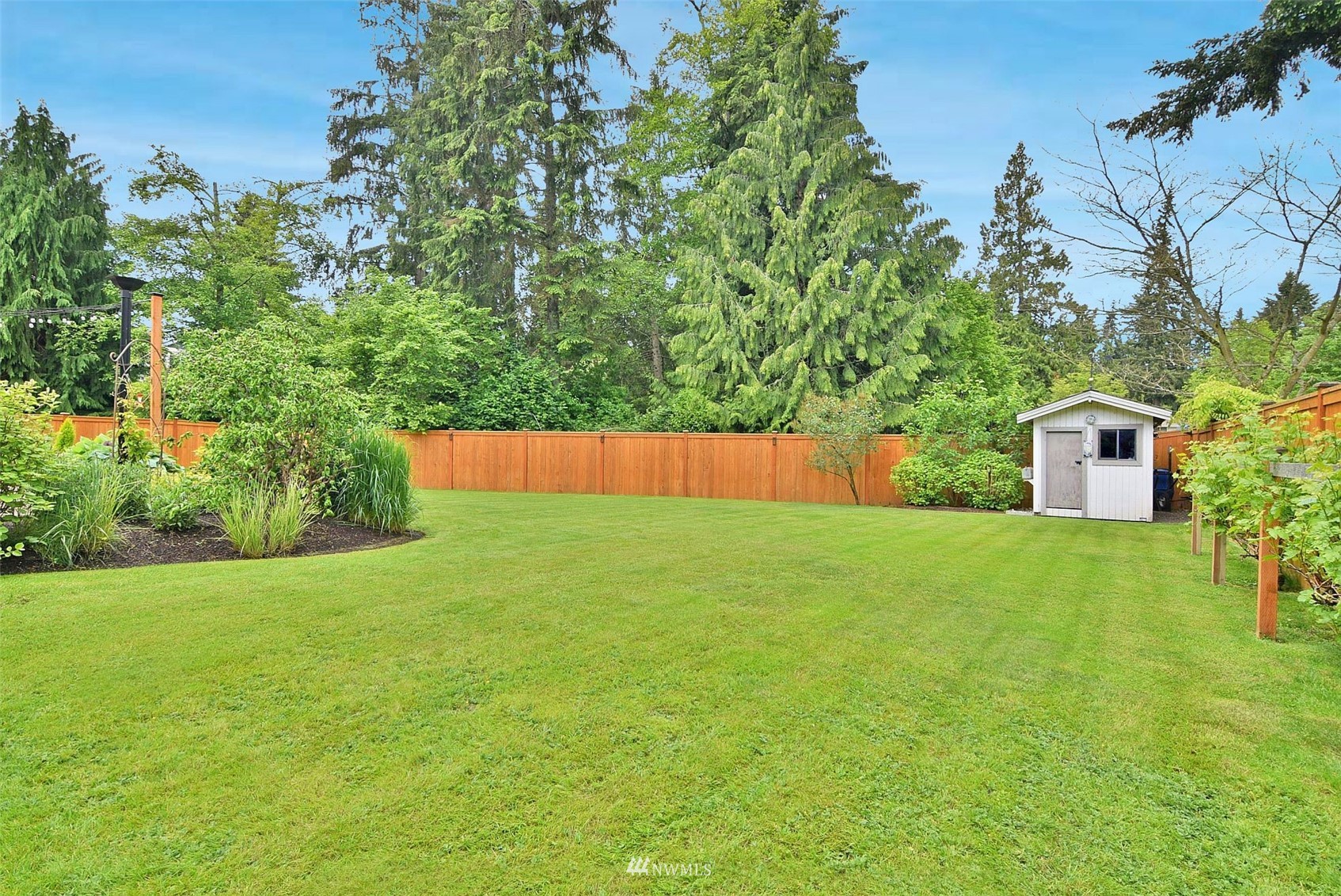 11810 37th Drive Southeast Everett, WA 98208 - Photo 26 of 28 a house is sitting in middle od the grass
