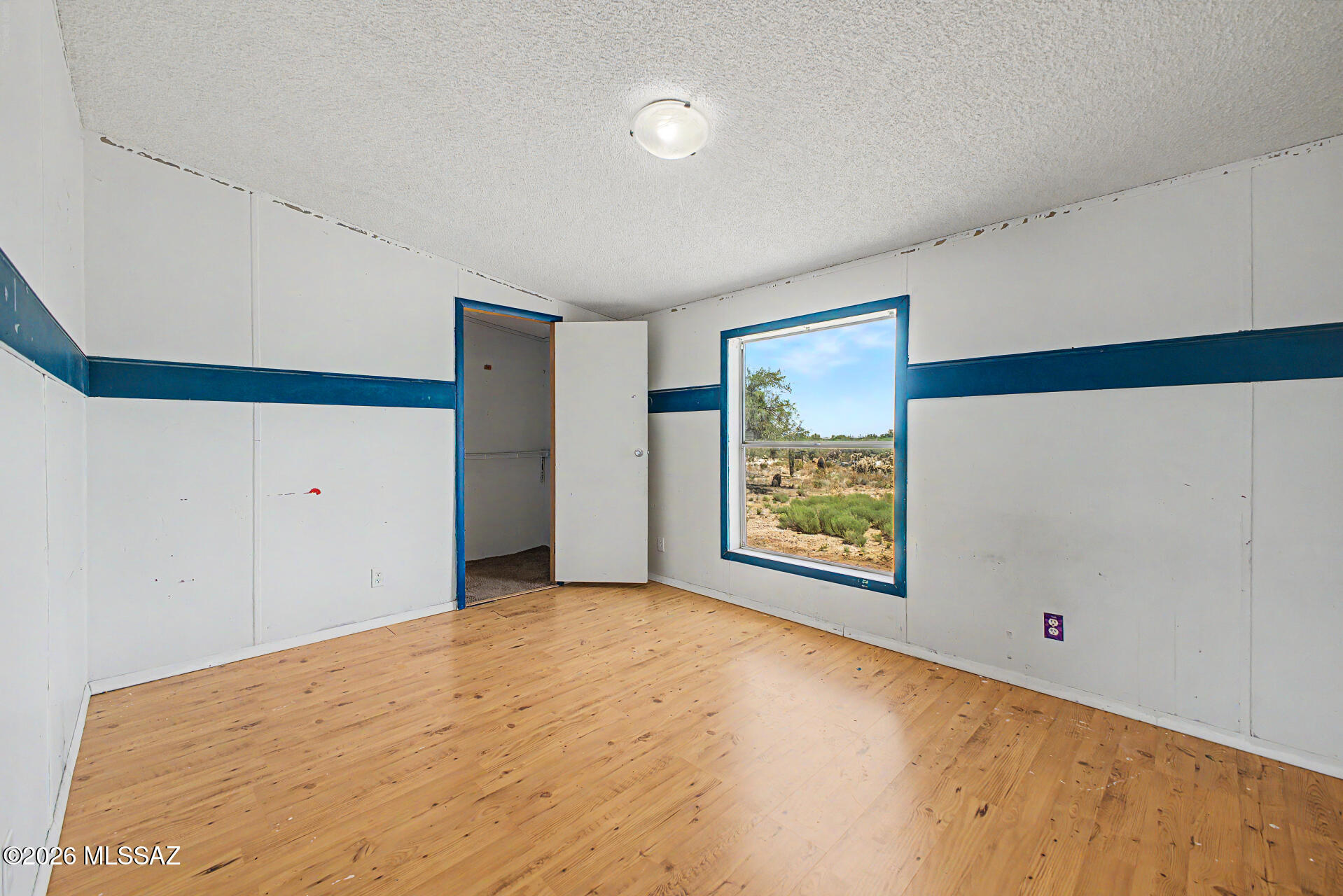 1911 West Thunder Road Vail, AZ 85641 - Photo 24 of 38 a view of an empty room with a window