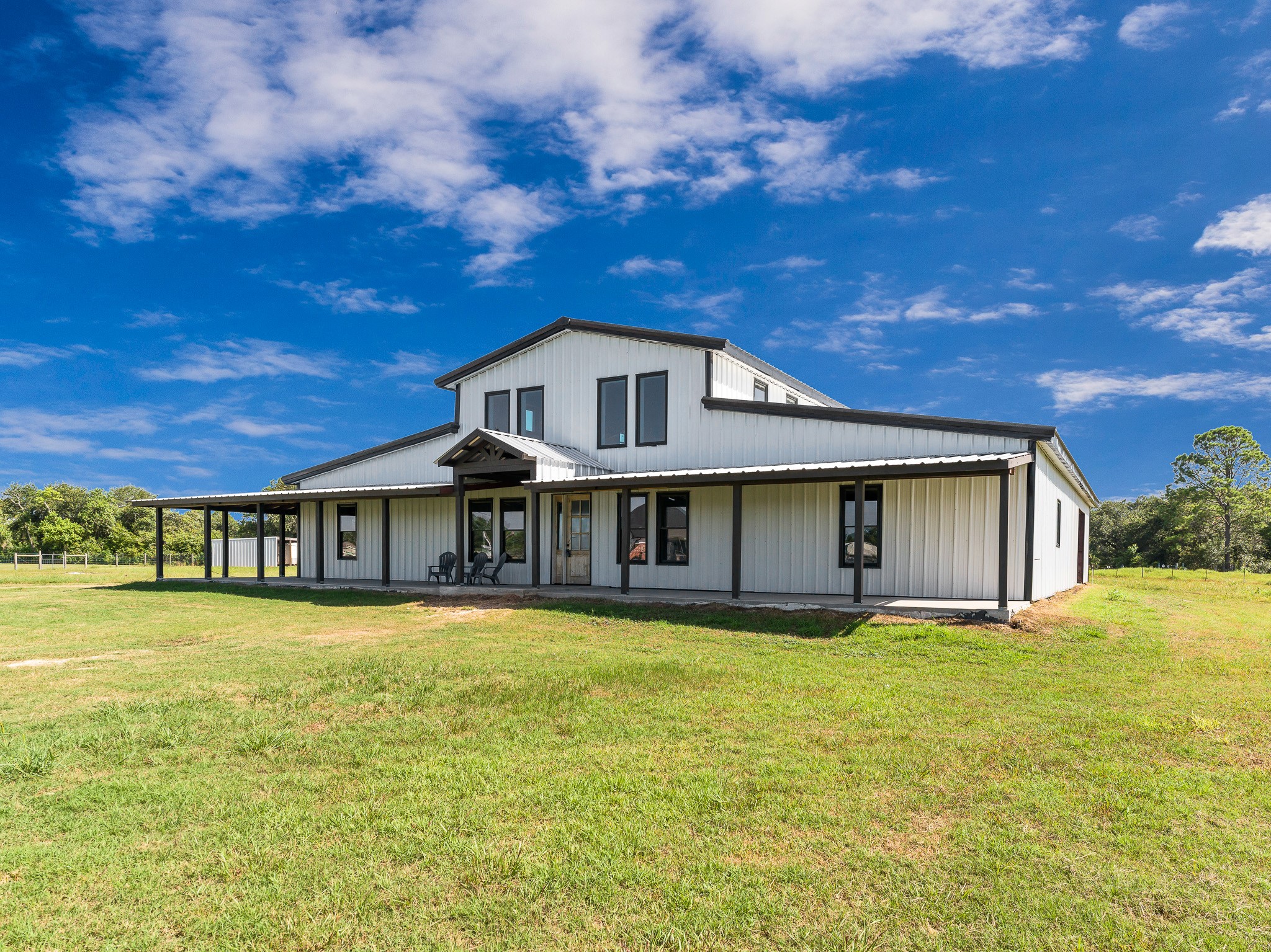 a view of a house with a big yard