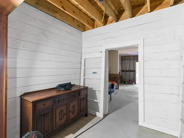 a bathroom with a tub and a shower