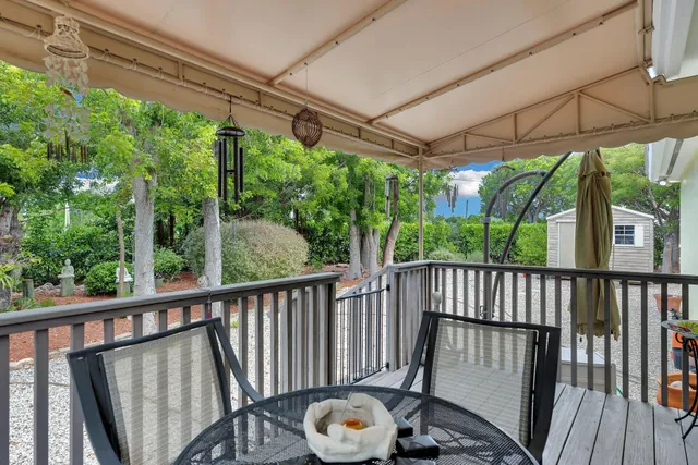a view of a chair in wooden deck