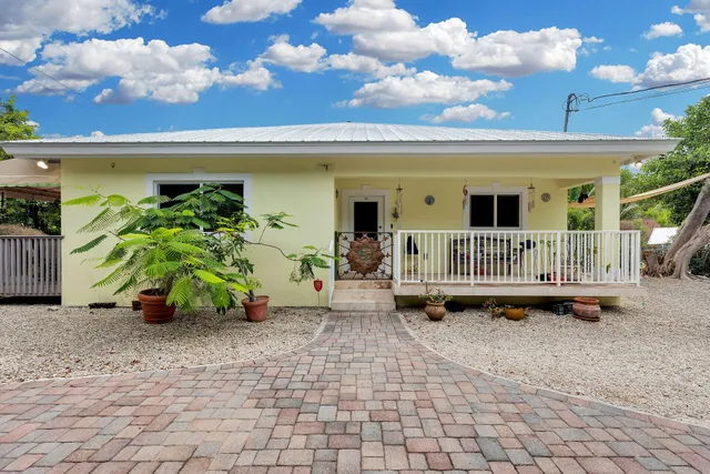 a view of a house with roof deck