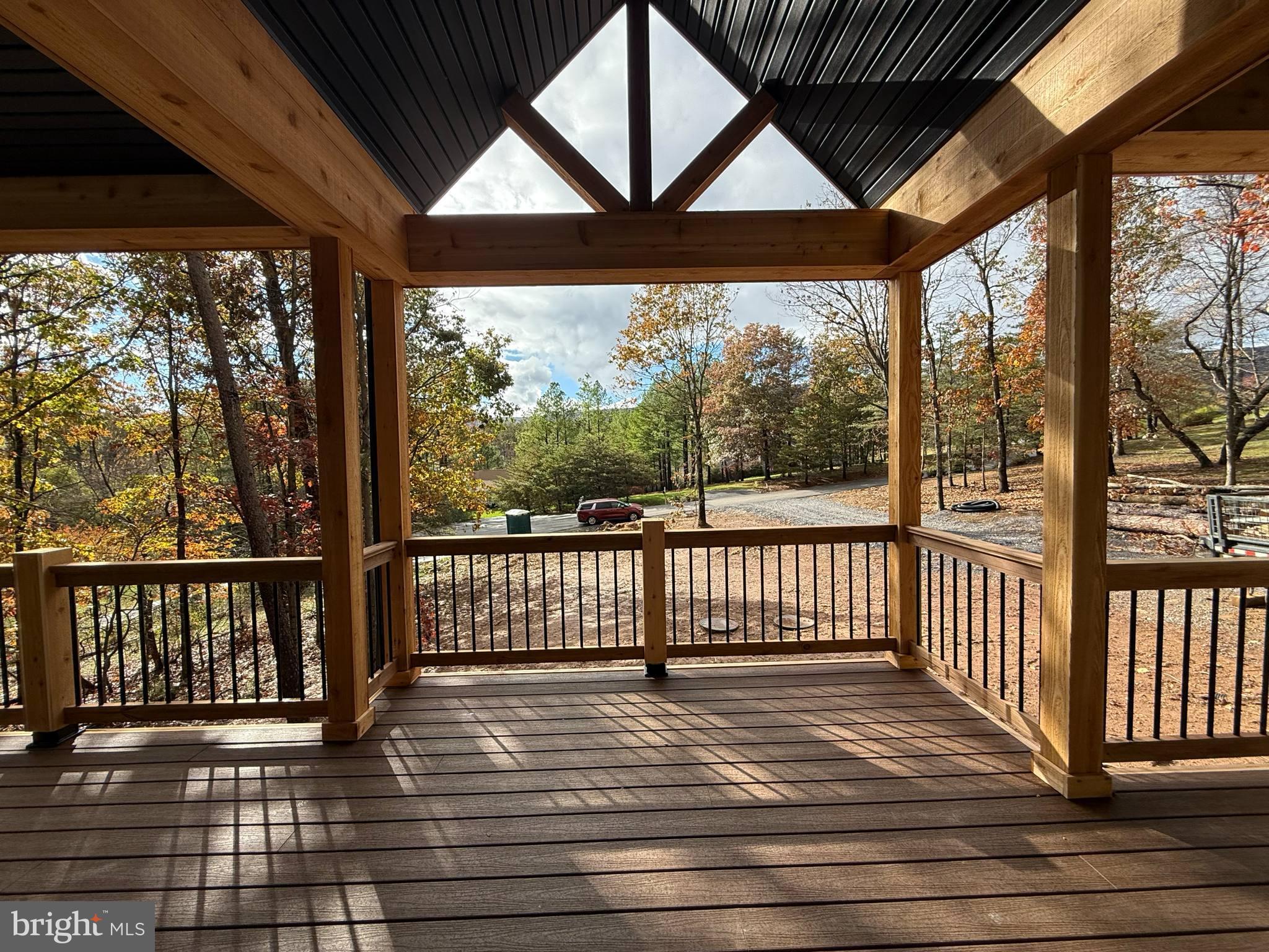 539 Prado Way Berkeley Springs, WV 25411 - Photo 6 of 10 a view of a wooden deck