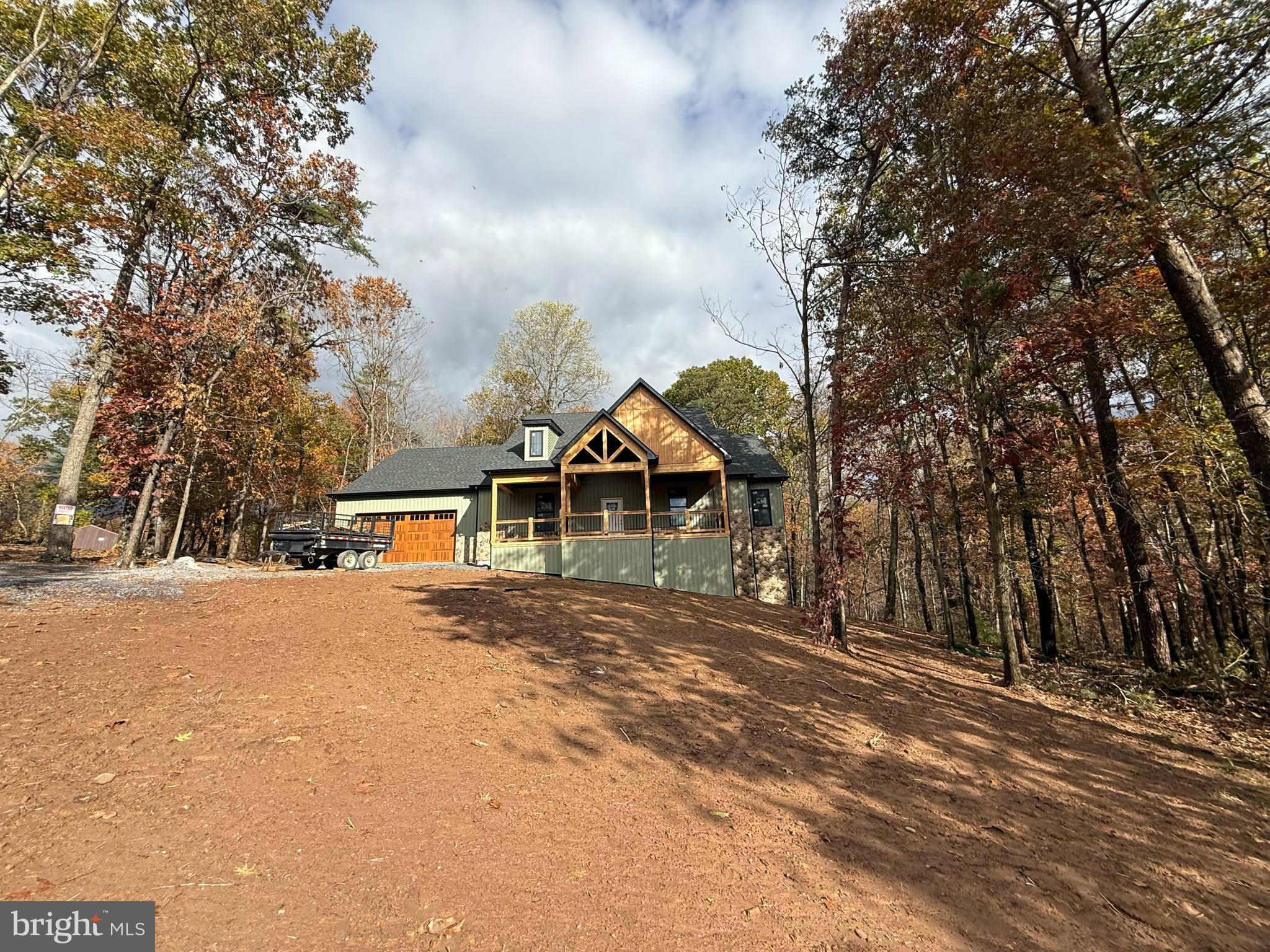 539 Prado Way Berkeley Springs, WV 25411 - Photo 8 of 10 a view of a house with a yard