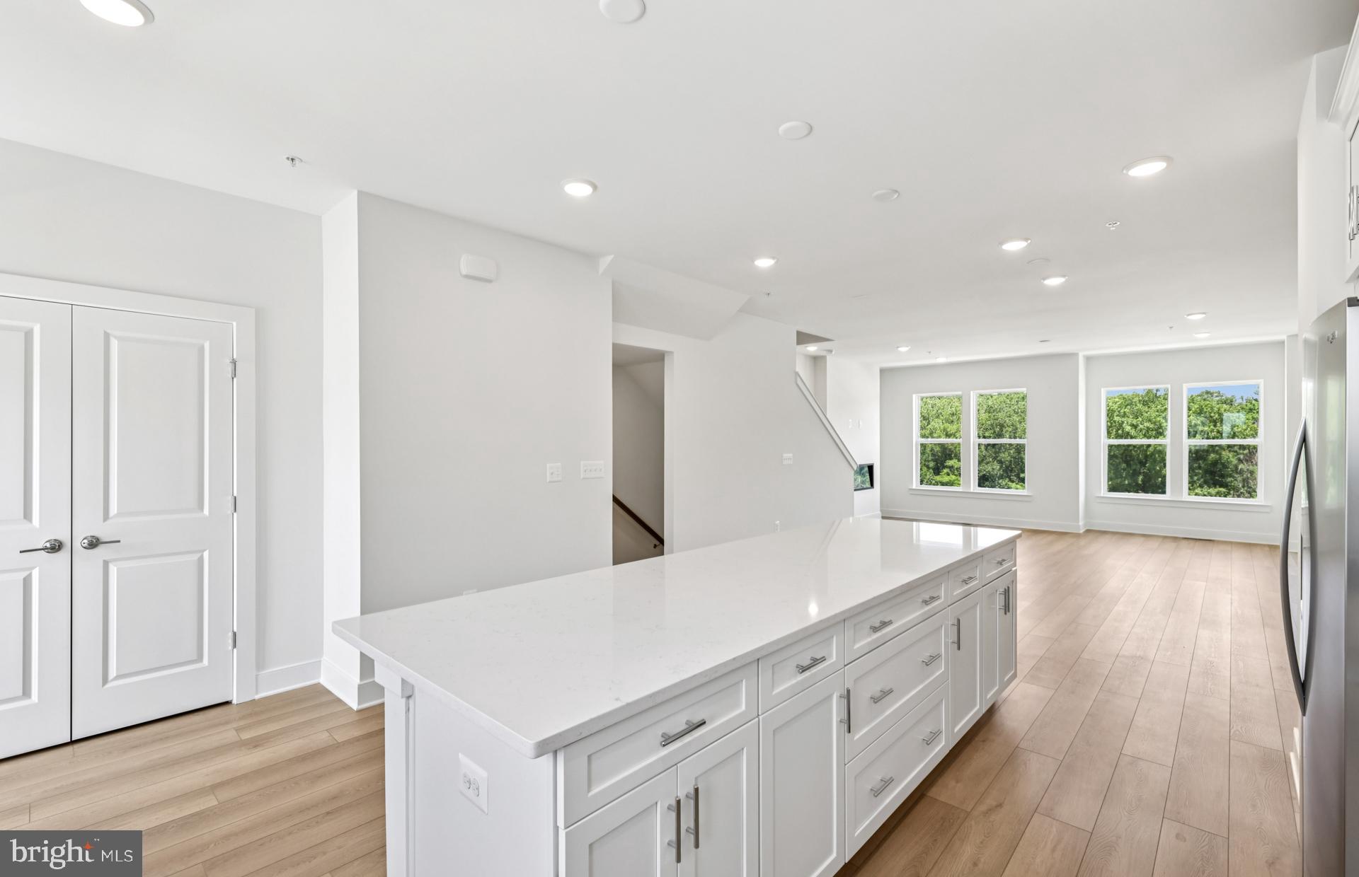 14420 Leafhopper Drive Boyds, MD 20841 - Photo 14 of 30 Kitchen Opening to Cafe and Gathering Room