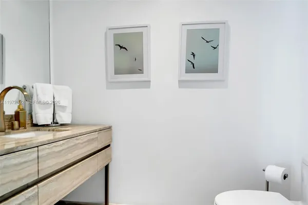 a view of lake with boats and trees