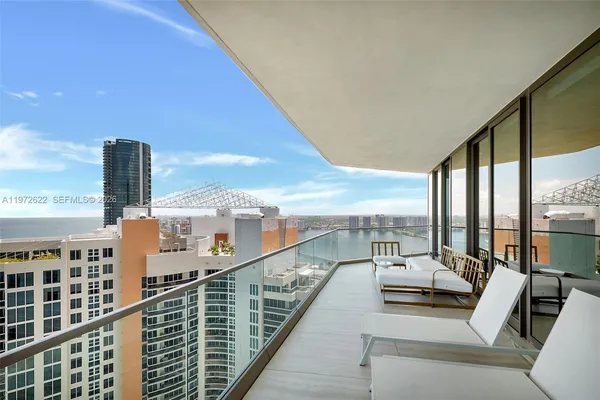 a bathroom with a shower and a sink