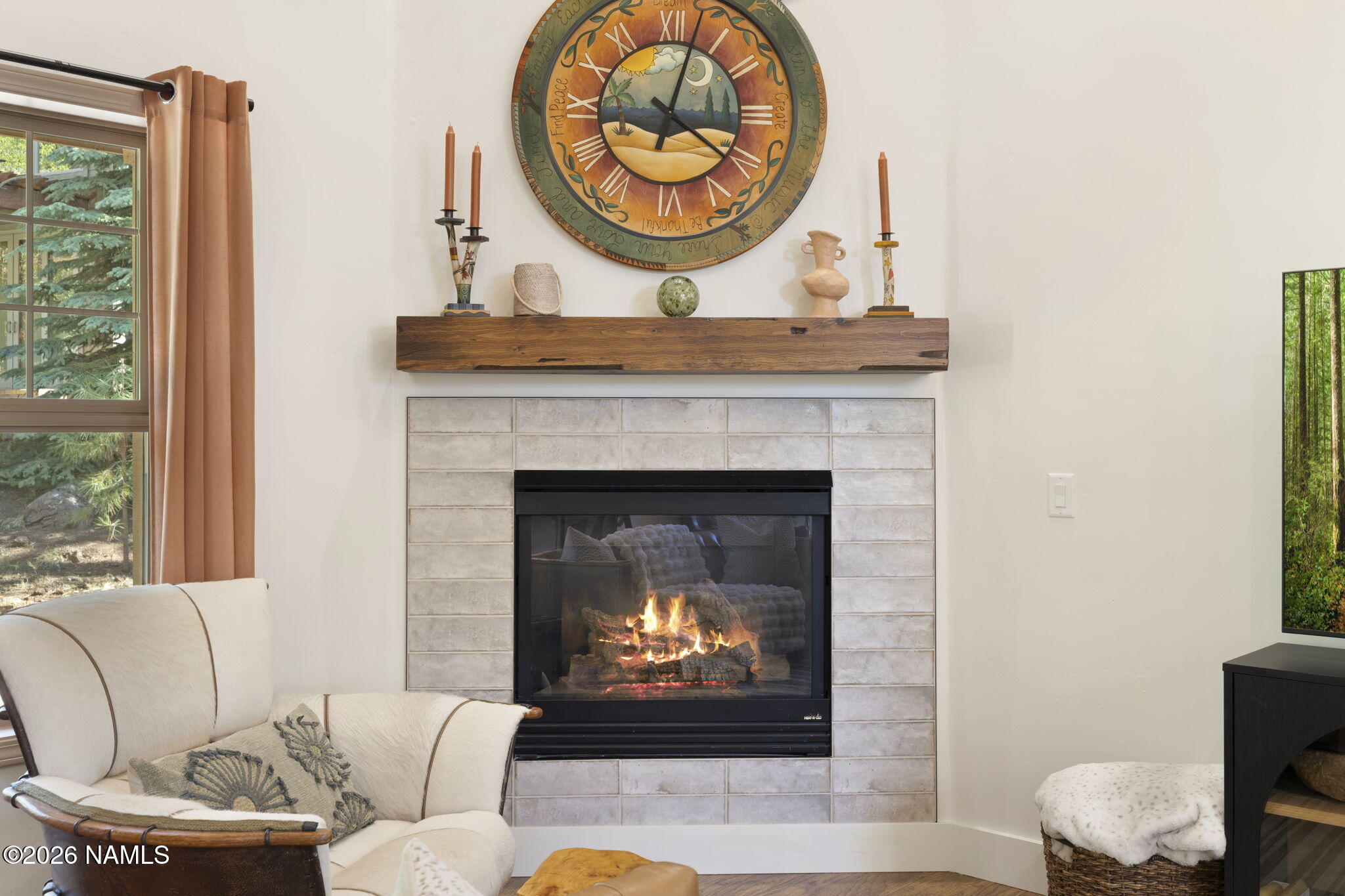 3495 West Lead Rope Flagstaff, AZ 86005 - Photo 15 of 49 a living room with furniture a rug and a fireplace
