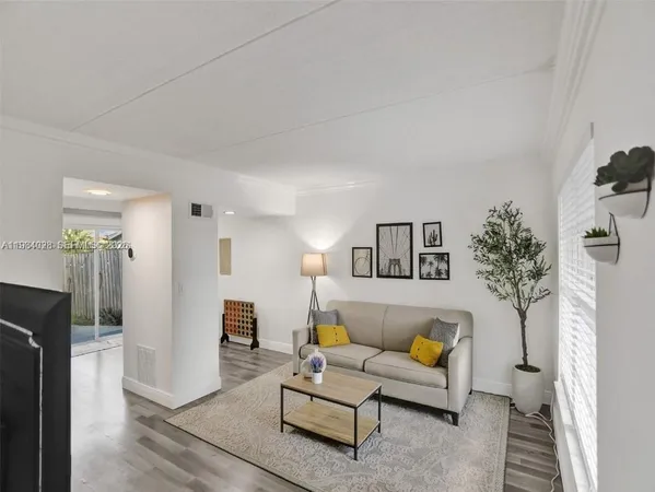 a living room with furniture and a couch