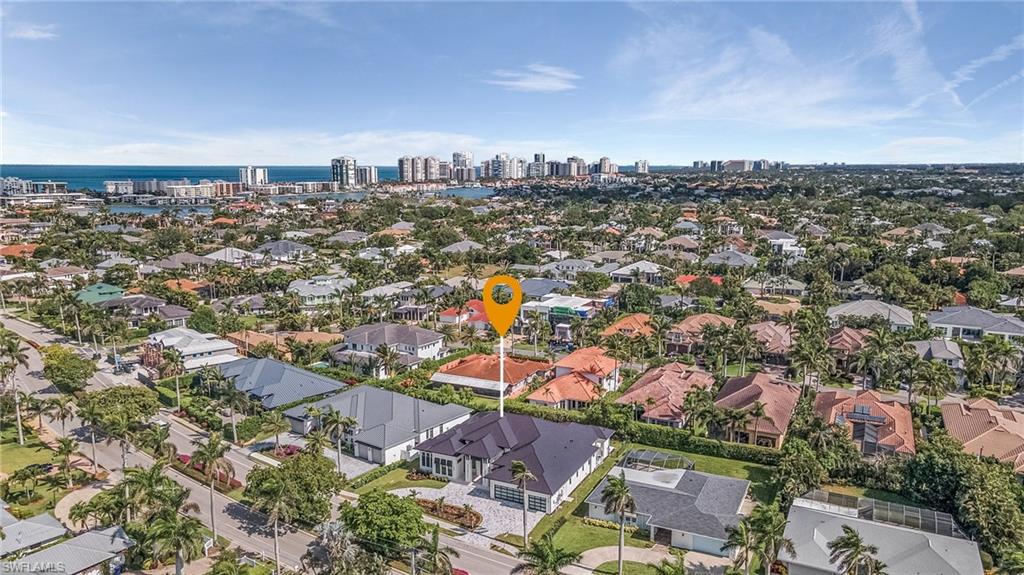 635 Harbour Drive Naples, FL 34103 - Photo 26 of 32 an aerial view of a city with lots of residential buildings