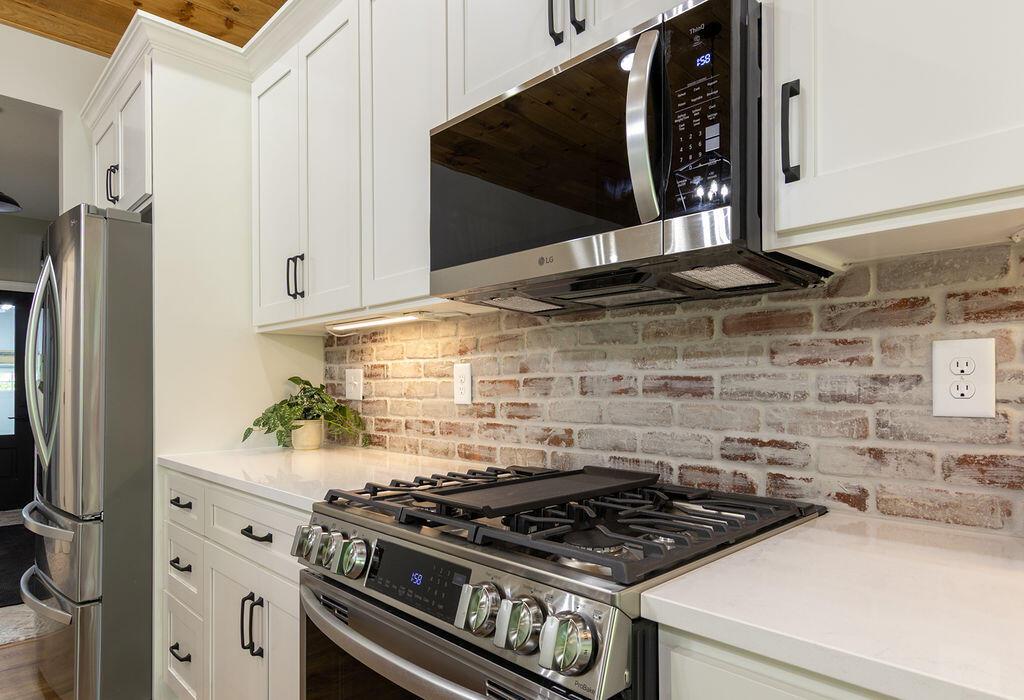 21650 Lake Road Glouster, OH 45732 - Photo 23 of 77 Custom brick backsplash