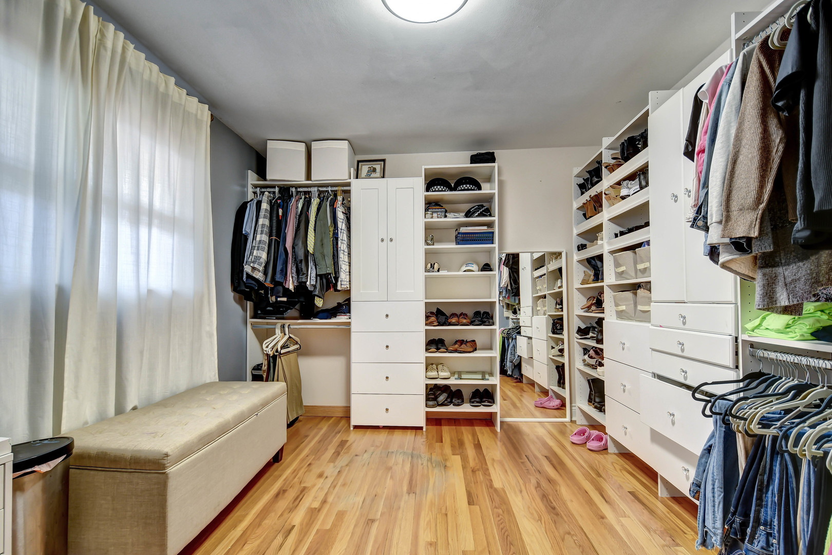 5700 South Monitor Avenue Chicago, IL 60638 - Photo 11 of 22 a view of walk in closet with clothes and shoes