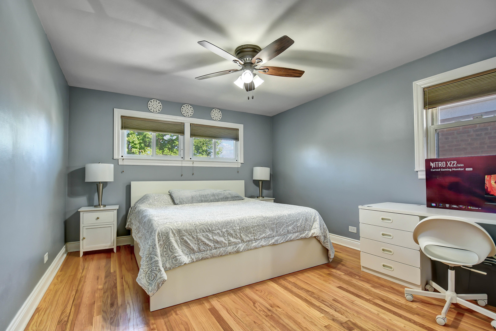 5700 South Monitor Avenue Chicago, IL 60638 - Photo 9 of 22 a bedroom with a bed and window