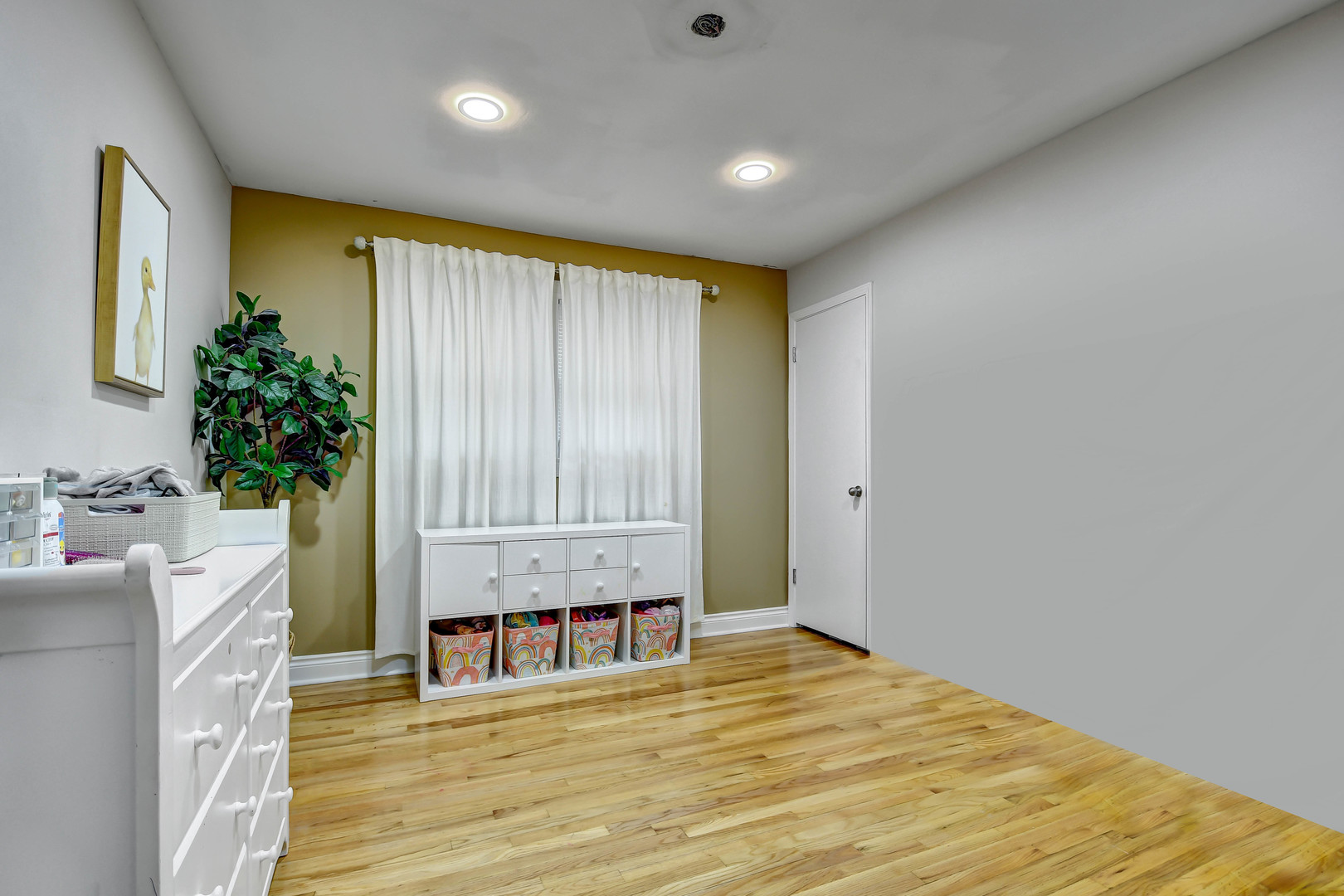 5700 South Monitor Avenue Chicago, IL 60638 - Photo 10 of 22 a view of a room with wooden floor and cabinet