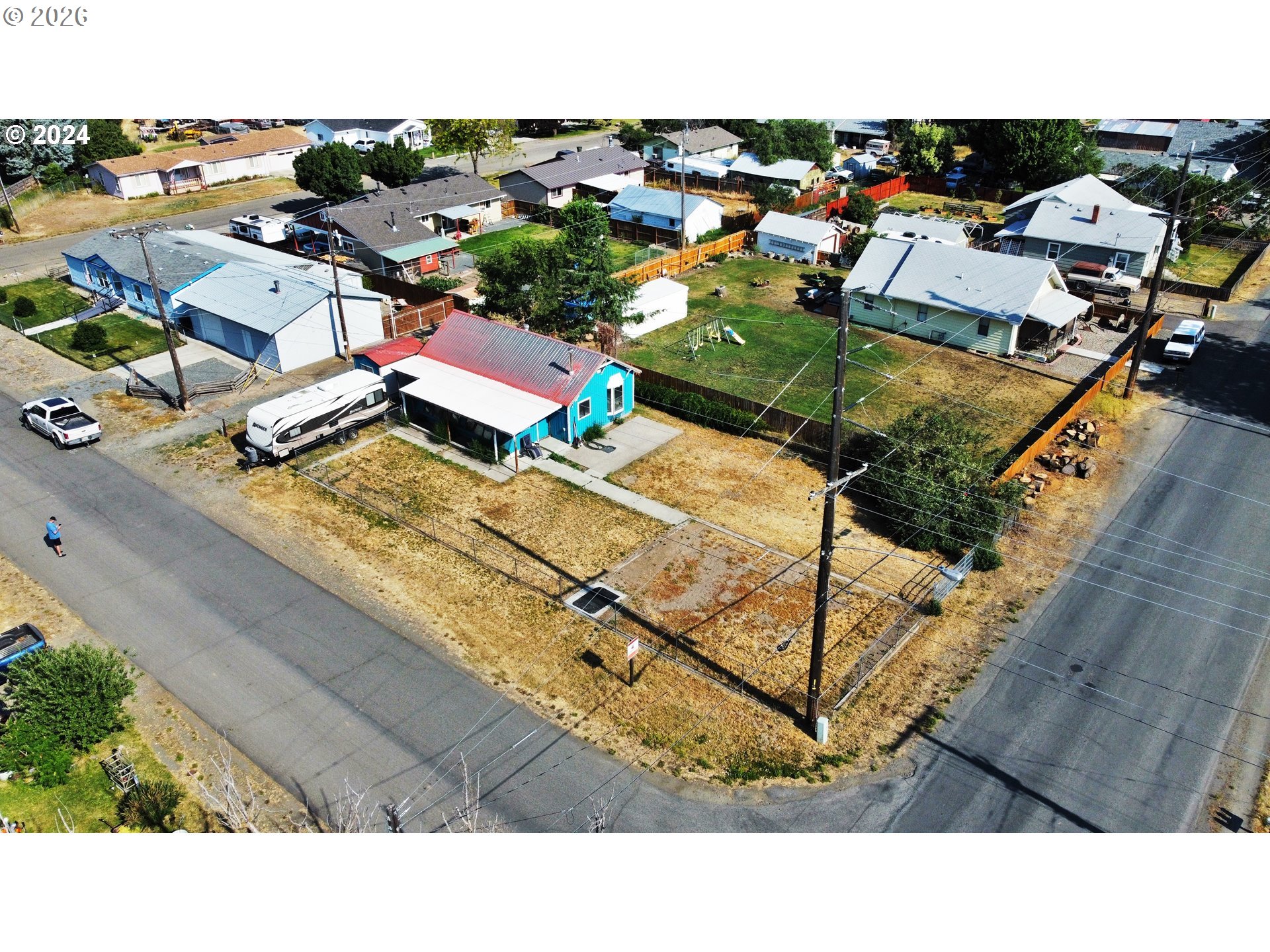 1905 17th Street Baker City, OR 97814 - Photo 13 of 13 an aerial view of a house with a swimming pool