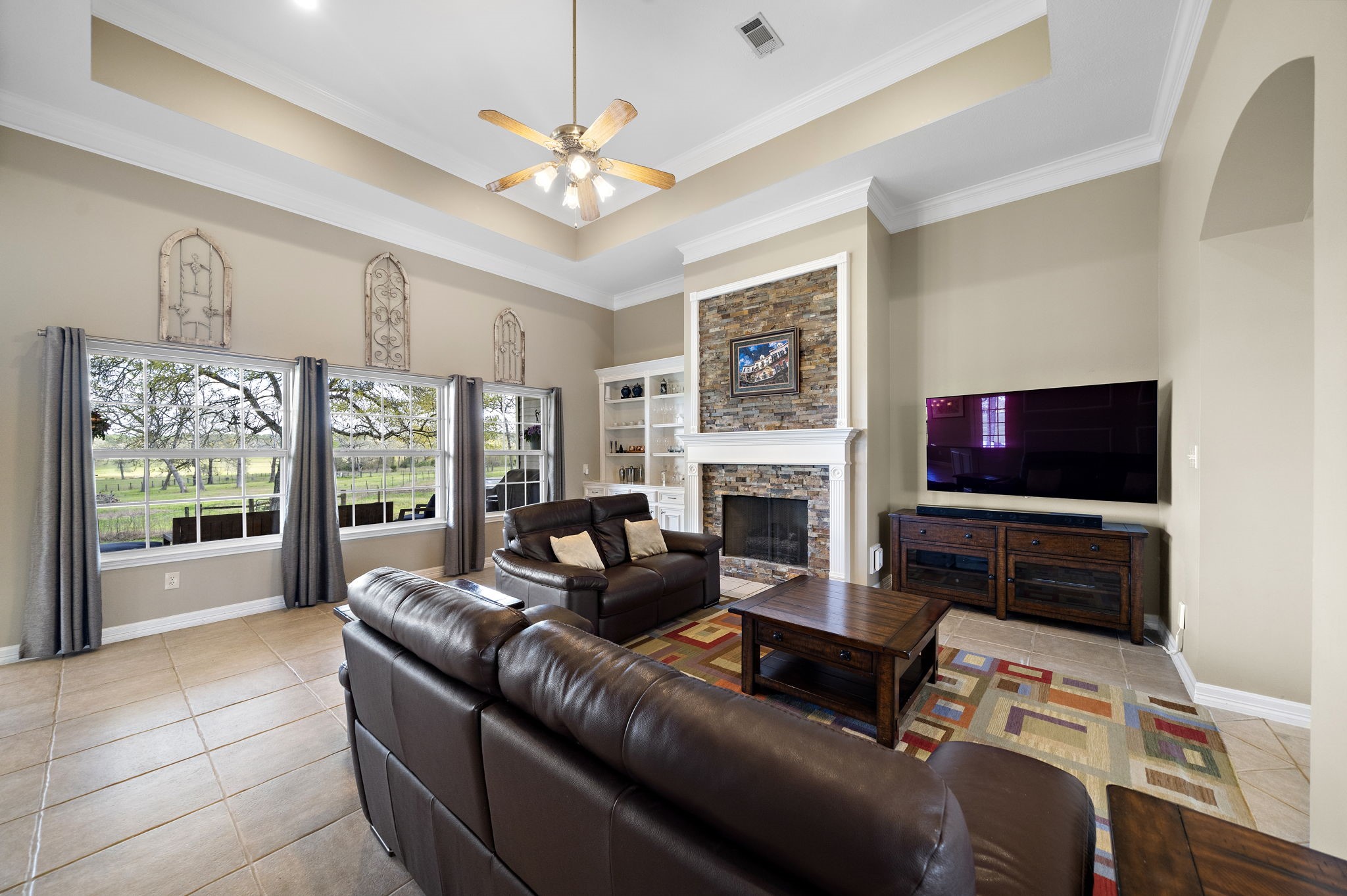 32540 Courtney Road Navasota, TX 77868 - Photo 12 of 50 Enjoy the cozy warmth of the fireplace, and the abundant natural light