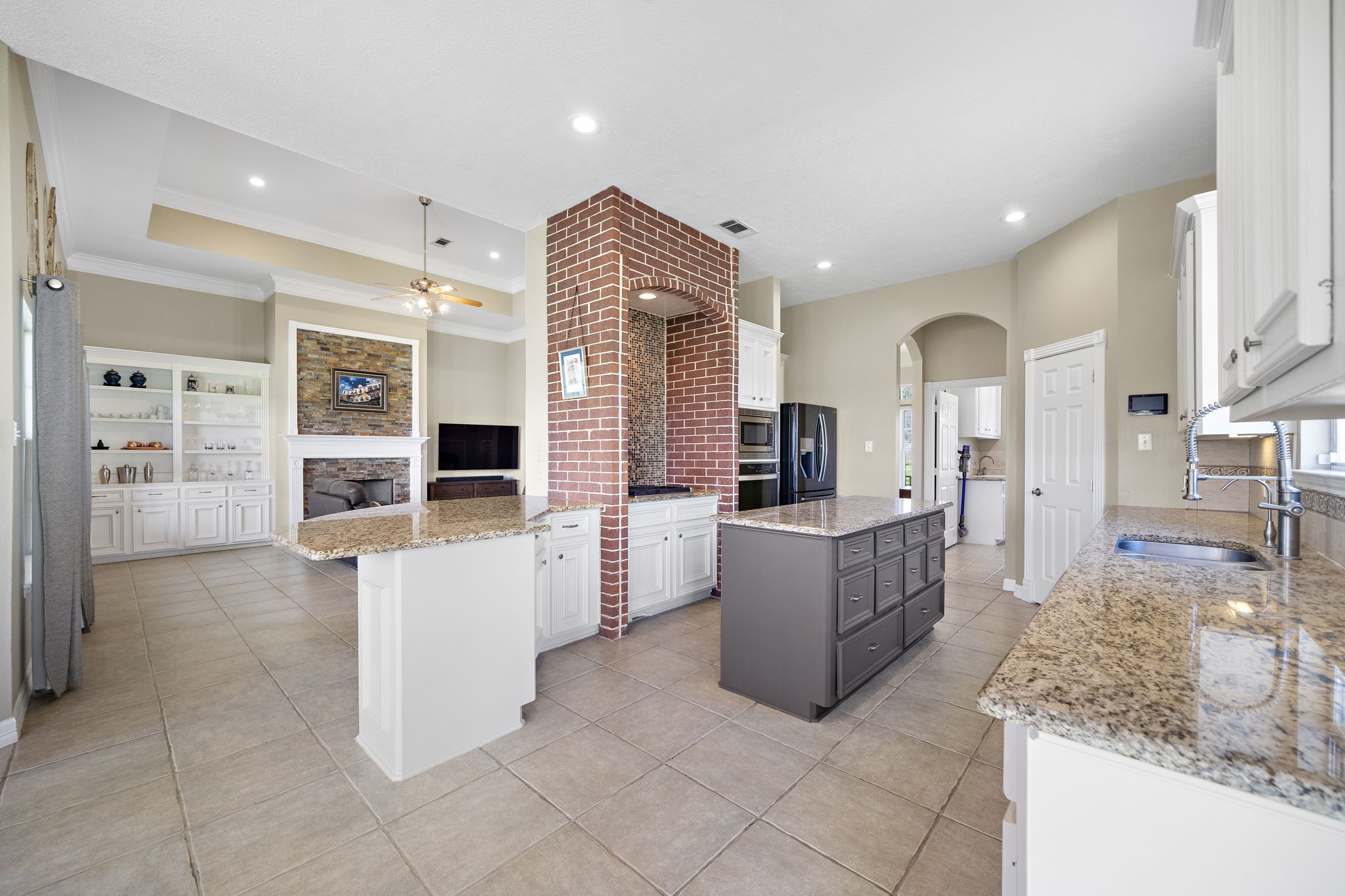 32540 Courtney Road Navasota, TX 77868 - Photo 15 of 50 Chef's dream kitchen, with brick cooktop surround adding a stunning accent to the space.