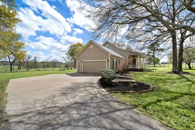 a view of house with a outdoor space