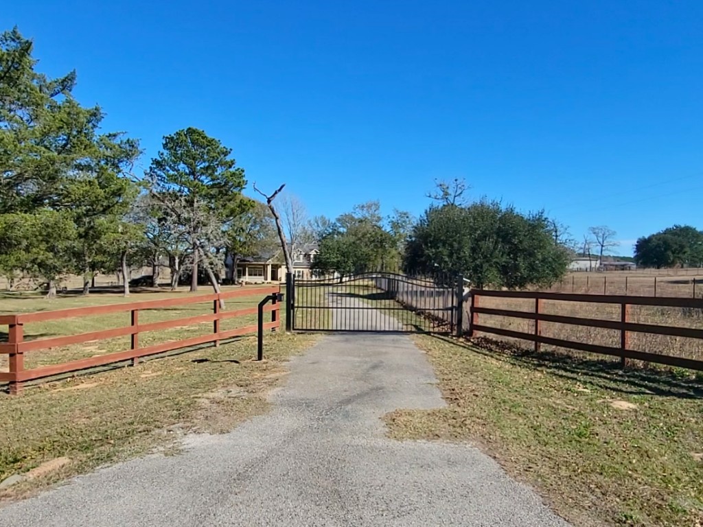 32540 Courtney Road Navasota, TX 77868 - Photo 6 of 50 A view of the front gate of the property