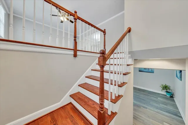 a view of entryway with wooden floor