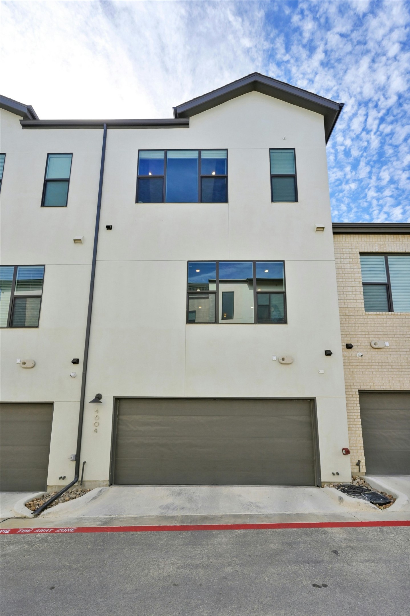 4604 Longevity Drive, Unit 306 Austin, TX 78731 - Photo 23 of 34 a house view with a outdoor space